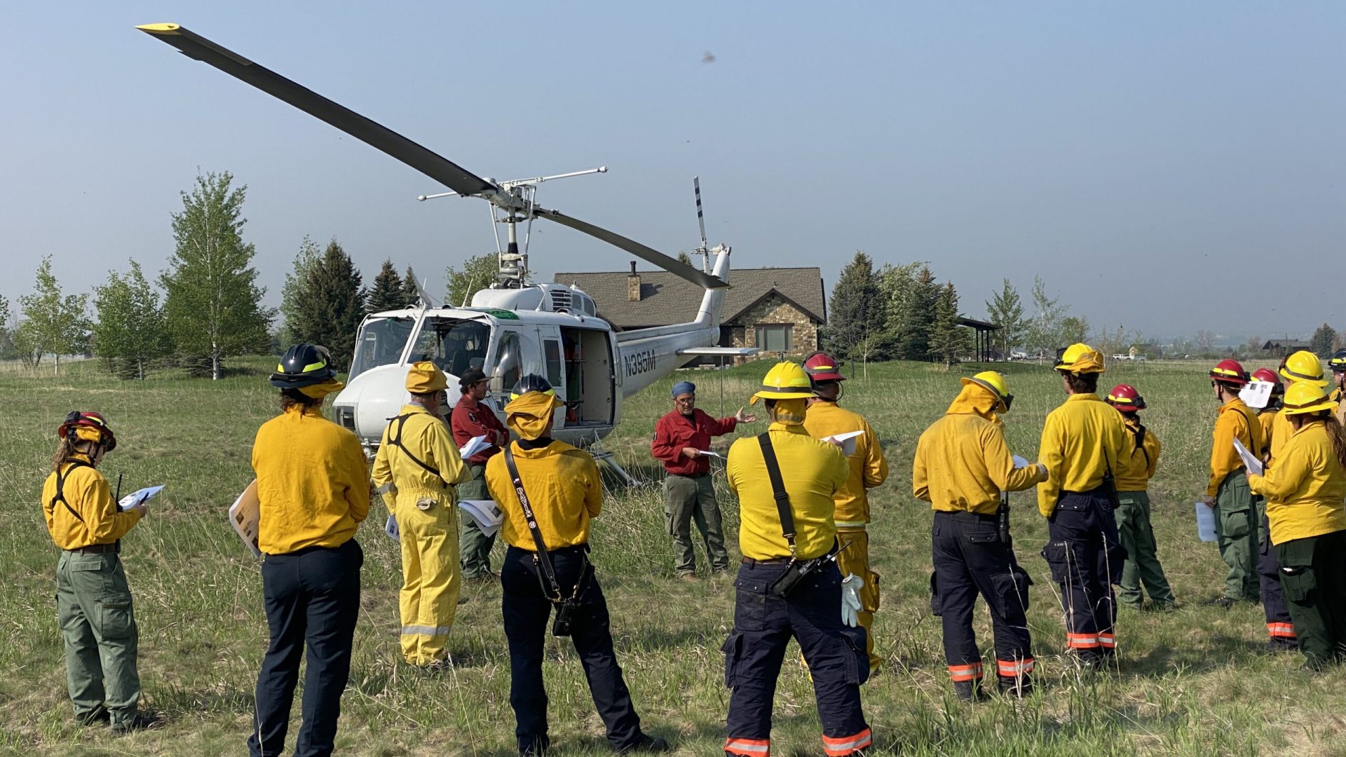 Photo of firefighter training with a helicopter.